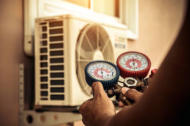 Professional Heat Pump Repair technician working in Palestine, TX